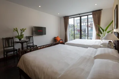 Deluxe 패밀리룸 — Centraltique Downtown - Bespoke Colonial House Near Hoan Kiem Lake